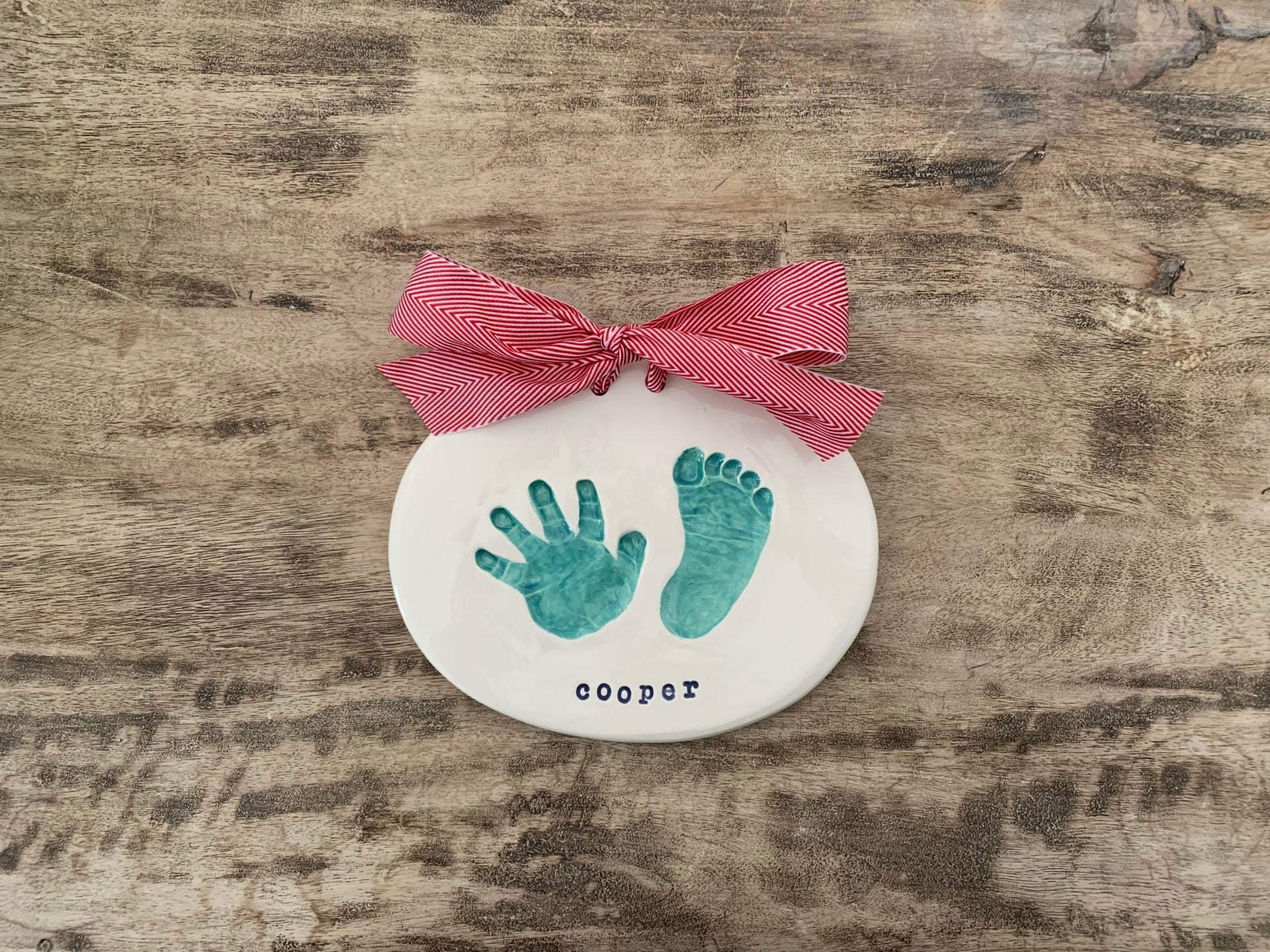 oval-shaped hand and footprint imprint