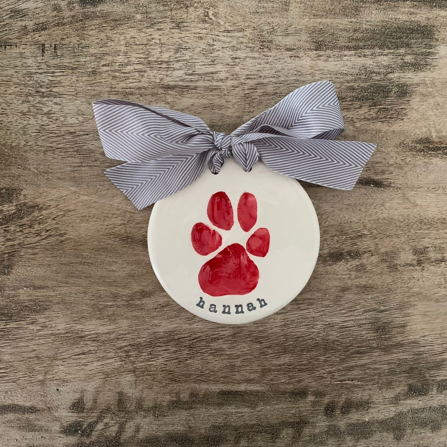 Red dog paw with dk grey ribbon