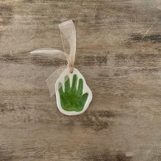 single handprint ornament green