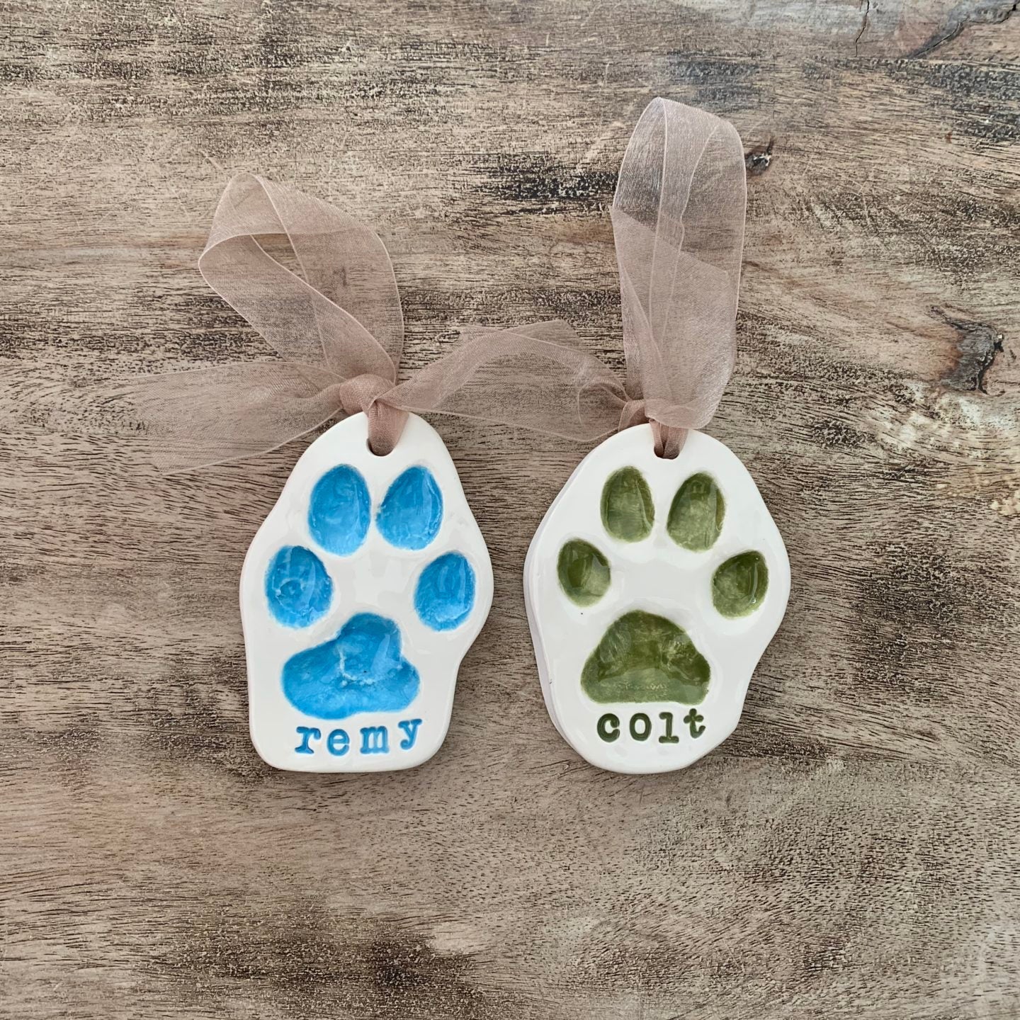two paw print ornamens